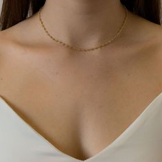 Elegant Gold Chain Necklace With Beads, Elegant Beaded Necklaces With Satellite Chain, Elegant Beaded Necklace With Satellite Chain, Delicate Gold Lariat Chain Necklace, Delicate Gold Figaro Chain Jewelry, Delicate Gold Jewelry With Figaro Chain, Gold Beaded Necklace With Delicate Chain For Wedding, Elegant 14k Yellow Gold Choker, Delicate Gold Figaro Chain Necklace