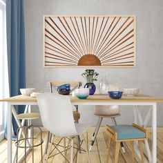 a dining table with four chairs and a vase on it in front of a window