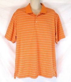 Adidas ClimaLite Mens Polo Shirt  Orange White Stripe  Size XL  Short Sleeve  CBK14 Pull Over  Previously worn. No observed flaws.   Length - 31" Armpit to armpit - 25" Shoulder to shoulder - 20.5" I will reduce shipping costs for multiple purchases paid with one PayPal payment.  There is no formula.  I will charge what it costs me to ship it to you.  If you make a multiple purchase, please wait to make payment until I send you an invoice for the combined purchase. Adidas Casual Short Sleeve Polo Shirt, Classic Adidas Cotton Tops, Classic Adidas Short Sleeve Tops, Orange Patterns, Mens Polo Shirt, Adidas Climalite, White Polo Shirt, White Polo, Paypal Payment