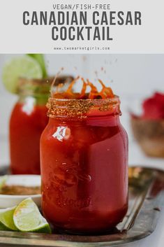 two mason jars filled with vegan fish - free canadian caesar cocktail on a tray