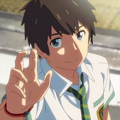 an anime character is making the peace sign with his hand while wearing a shirt and tie