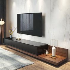 This modern adjustable TV stand is designed to fit any space, with a flexible length that can be customized to your needs. Featuring three large storage drawers with hidden buffer slides, it ensures smooth operation and ample storage. The grooved handles make drawer access easy, while the thickened tabletop and eco-friendly materials provide durability and a sleek, minimalist look. Perfect for any home decor, this TV stand combines functionality with style Hokku Designs Color: Black/Brown/Black Tv Stand Decor Living Room, Ruang Tv, Wood Media Console, White Tv Stands, Fireplace Shelves, Tv Stand Decor, Living Room Tv Cabinet, Tv Unit Designs, Living Room Tv Unit Designs