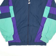 Item is in good used condition. >Size: UK 8 >Armpit To Armpit: 24" >Armpit To Cuff: 22" >Collar To Hem: 26" Casual Blue Patchwork Track Jacket, Casual Blue Track Jacket With Patchwork, Blue Windbreaker With Contrast Colors For Winter, Vintage Blue Color Block Outerwear, Casual Blue Patchwork Windbreaker, Blue Casual Track Jacket With Contrast Color, Casual Blue Track Jacket With Contrast Color, 90s Patchwork Blue Outerwear, 90s Blue Patchwork Outerwear