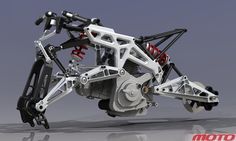 an image of a robot that is on wheels and has gears attached to the back