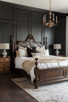 a large bed sitting in a bedroom on top of a hard wood floor next to a chandelier