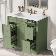 a bathroom vanity with drawers and a sink