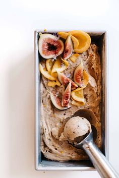 a pan filled with ice cream and sliced figs