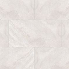 a white marble tile floor with grey veining