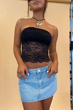 Also available in White. Product Deets Black lace crop tube top Self: 85% nylon, 15% spandex Lining: 100% polyester Floral lace fabric Bust is lined in front, rest is unlined Scalloped hem detail all around Size small measures 11” long in front Runs true to size Model Info Mel is 5’1. Waist: 25" Bust: 32B Wearing size Small. Strapless Lace Top With Built-in Bra, Fitted Sleeveless Tube Top With Lace Trim, Lace Crop Top With Built-in Bra And Stretch, Fitted Lace Trim Sleeveless Tube Top, Fitted Sleeveless Lace Trim Tube Top, Stretch Strapless Tops With Lace Trim, Stretch Lace Tube Top With Lace Trim, Fitted Strapless Crop Top With Lace Trim, Strapless Fitted Crop Top With Lace Trim