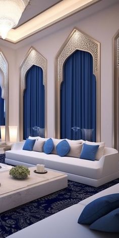 a living room with blue and white decor on the walls, couches and coffee table