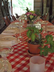 the table is set with place settings for dinner