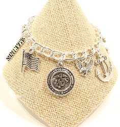 "A lovely  bracelet especially for a Military wife, mom and daughter!  choose your style at checkout  Please see all the above pictures - if you have any questions contact me DETAIL: A) Navy charm bracelet B) keychain with medallion C) anchor keychain, short D) anchor keychain, long D) anchor keychain, anchor with circle Bracelets are adjustable as the silver links measure to 8\" so you can close the bracelet in any link for your fit Keychain, Necklace or Earrings available - just ask Personaliz Anchor Keychain, Music Note Bracelet, Marine Jewelry, Military Bracelet, Marine Gifts, Military Jewelry, Silver Earrings Online, Anchor Jewelry, Fitness Jewelry