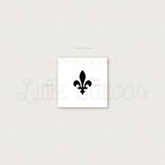 a white square sticker with a black fleur de lis logo on it