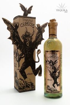 a bottle of tequila chambos next to a cardboard box with an image of a demon on it