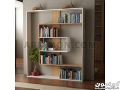 a book shelf filled with lots of books on top of a hard wood floor