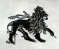 a black and white image of a lion on a white shirt with long manes