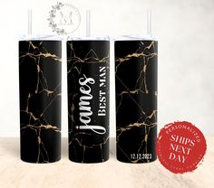 three black marble tumblers with white lettering on them