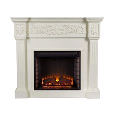 a white fireplace with an ornate design on the mantle