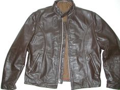 "Vintage Men's Brown Leather Cafe Racer Motorcycle Jacket Size: 44 CONDITION The leather shell is in good condition. The right sleeve wrist has a 1\" open seam - check out my photo. The removable lining is missing. The orange piping at the neck is missing in some spots. There has been repair stitching done under the arms. Great side zippers. The chain pull on the left front pocket is missing. All zippers and snaps work smoothly. OUTSIDE MEASUREMENTS Chest Width Flat Across (armpit to armpit):  2 Racer Motorcycle, Cafe Racer Motorcycle, Vintage Leather Jacket, Biker Jacket, Vintage Leather, Cafe Racer, Motorcycle Jacket, Front Pocket, Vintage Men