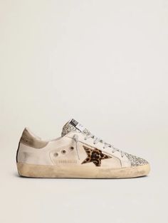 Super-Star sneakers with platinum-colored glitter tongue and leopard-print pony skin star | Golden Goose Leopard Outfits, Goose Sneakers, Leopard Sneakers, Golden Goose Shoes, Star Shoes