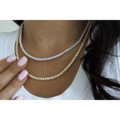 Beautiful, High Quality Tennis Chain Necklace Featuring Round Cubic Zirconia Stones. A Sophisticated Necklace To Add Glam To Your Look! Available In Silver Or Gold 18k White Gold Or Gold Plating Over Metal Alloy Highest Quality Cubic Zirconia Stones Available Lengths: 16", 18" Available Thicknesses/Widths: 3mm, 4mm, Or 5mm This Item Is Plated To Resist Against Tarnishing. Over Time, Plated Jewelry May Tarnish And To Prevent This, We Recommend Avoiding Exposure To Water, Sweat, Etc To Ensure The Everyday Silver Crystal Necklaces, Everyday Silver Crystal Necklace, Silver Cubic Zirconia Chain Necklace, Everyday Silver Cubic Zirconia Chain Necklace, Everyday Silver Diamond Necklace With Vvs Clarity, Dazzling Silver Necklace For Everyday, Silver Tennis Necklace With Ethical Diamonds, Silver Tennis Necklace With Rhinestones, Classic Cubic Zirconia Necklace With Bling