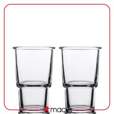 two glasses sitting next to each other on a white surface