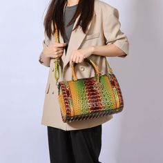 The Eleanor Satchel Bag is a stylish and trendy handbag designed for women. Its gradient rainbow faux crocodile embossed exterior is a unique design that sets it apart. It radiates both sophistication and playfulness, giving it a luxurious and exotic look. This style is designed with gold-tone embellishment. The Satchel is not just about style; it's about practicality. It features top handles and a detachable and adjustable shoulder strap, making it versatile and easy to carry, no matter the occ Trendy Handbag, Trendy Handbags, Woven Tote Bag, Open Weave, Satchel Handbags, Satchel Bag, Fabric Names, Leather Care, Satchel Bags