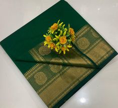 It's a beautiful chettinad cotton saree with  broad zari border pattern . Saree length - 5.5 mtr. Running blouse - 1 mtr.  Please note - color may be vary a little due to sunlight and photography . Please message us after purchasing in case you want fall and Pico done it not . No extra charges for fall and Pico but inform us . Blouse stitching is also available . Please check all details carefully before placing any order , in case of any doubt message us . Check your address details for avoid a Green Cotton Traditional Wear With Zari Weaving, Green Cotton Saree With Zari Weaving, Bollywood Cotton Saree With Border, Bollywood Style Cotton Saree With Border, Unstitched Cotton Saree With Border, Unstitched Cotton Saree With Border Detail, Green Cotton Saree With Printed Border, Cotton Saree With Border For Navratri, Cotton Dupatta With Border For Diwali