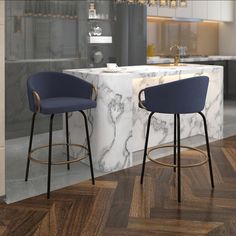 two stools sitting next to each other in front of a marble counter top and bar