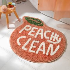 an orange rug with the words peachy clean written on it