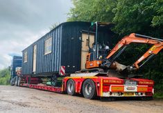 a large truck with a crane on it's back