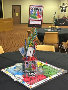 a board game sitting on top of a table in front of a black table cloth