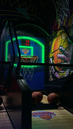 basketballs and neon lights in a dark room