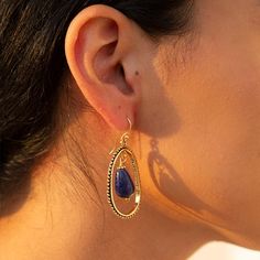 Transform your look with these handcrafted Inline Blue Lapis Drop Golden Earrings. The vibrant blue lapis stone adds a pop of color to the semi-oval golden brass design. Measuring 1.75" in length and 1" at its widest point, these earrings are sure to make a statement. Crafted and finished by hand with a total weight of 11.5g, they are a unique and elegant addition to any collection. Enhance your style and feel the passion in every detail of these earrings. Description:Lapis Lazuli is a deep blue Lapis Stone, Golden Earrings, Blue Lapis, The Passion, Vibrant Blue, Turquoise Sterling Silver, Ring Necklace, Deep Blue, Lapis Lazuli