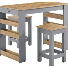 a wooden table and two stools sitting next to each other