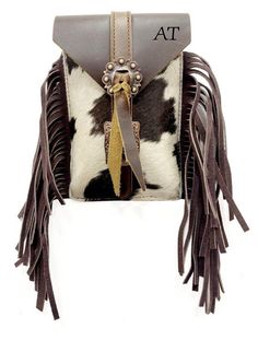 Add a touch of Western chic to your everyday style with this l Hair on Cowhide Saddle Bag. Crafted from real cowhide, each bag boasts unique color tones and patterns, making it truly one-of-a-kind. Ideal for carrying your phone, keys, money, snacks, and more, this saddle bag measures 8.5" x 5", providing just the right amount of space for your essentials. Make it your own by personalizing it with your initials or name. Stand out from the crowd with this distinctive and practical accessory. Personalized Travel Bag, Saddle Accessories, Western Chic, Flower Girl Gifts, Gifts For Grandparents, Grandparent Gifts, Color Tones, Wedding Item, Personalized Initials