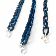 Navy acrylic chains for your eyewear (sunglasses, readers, etc.) are available in three FAB styles. Choose your preferred style (1, 2 or 3) and length (22, 24, 26, 28 or 30 inches) from the drop down menus. Lobster clasps are matte silver (matte gold is also available by request just leave a note at checkout that you prefer matte gold clasps). These chains will not only elevate your look, they will help you ensure you never lose your frames again! All chains come with one pair of rubber connecto Trendy Blue Glass Glasses Chains, Trendy Blue Glasses Chains As Fashion Accessory, Trendy Adjustable Blue Glasses Chain, Trendy Blue Glasses Chains As Gift, Chain For Glasses, Sunglass Chain, Alexandria Va, Eyeglass Chain, Glasses Chain