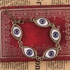 Harajuku Devil Eyes Bracelet from Harajuku fashion on Storenvy Devil Eyes, Devil Eye, Backless Prom Dresses, Prom Dresses Online, Evil Eye Charm, Harajuku Fashion, Vintage Bracelets, Alex And Ani Charm Bracelet, Small Businesses