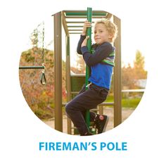 a young boy is climbing on a playground pole with the words fireman's pole above him