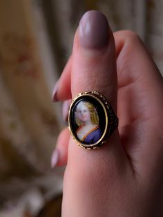 Enamel Portrait Ring of Young Girl Circa 1860 Vintage Engraved Ring With Historical Design, Antique Engraved Cabochon Ring, Vintage Jewelry With Historical Design, Heirloom Style Formal Enamel Ring, Vintage Engraved Cabochon Ring For Formal Occasions, Formal Vintage Engraved Ring With Cabochon, Vintage Oval Rings With Historical Design, Vintage Engraved Enamel Ring, Vintage Enamel Wedding Ring