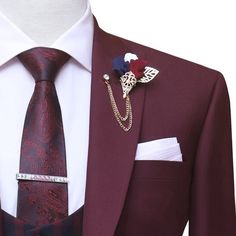 Look your best on any special occasion with a custom burgundy 3 piece suit. Made from premium quality wool suiting fabric and featuring a classic peak lapel, single button front closure, and double flapped pockets, this suit is sure to turn heads. A checkered vest adds a touch of elegance and sophistication, making it the perfect suit for weddings, proms and other formal events. Features: Made from premium quality wool suiting fabric. Classic peak lapel Single button front closure Double flap po Elegant Fitted Burgundy Suit And Tie Accessories, Elegant Burgundy Fitted Suit And Tie Accessories, Semi-formal Fitted Burgundy Suit And Tie Accessories, Red Tuxedo Style Three-piece Suit For Groom, Red Three-piece Suit With Notch Lapel For Groom, Red Notch Lapel Three-piece Suit For Groom, Classic Red Suits For Groom, Classic Red Suit For Groom, Classic Red Three-piece Suit For Groom