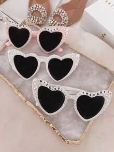 All heart eyes for these hand studded sunnies with multi sized pearls. Each pair is hand-made and therefore unique. Shipped in the cutest white box with included sunglasses sleeve. Perfect for travel and doubles as the sweetest gift. Playful Sunglasses For Party, White Heart-shaped Sunglasses For Summer, Heart-shaped Sunglasses With Uv Protection As Gift, Summer Gift Sunglasses, Chic Sunglasses With Tinted Lenses, White Heart-shaped Sunglasses For Beach, Handmade Sunglasses For Summer Parties, Cute White Sunglasses For Gift, Playful White Sunglasses For Gift