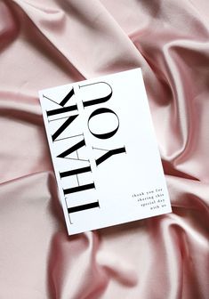 a book that is laying on top of a pink sheet with the words think you do