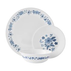 blue and white dinnerware set with floral designs