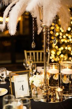 the table is set with candles and decorations