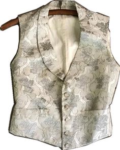 Elegant Wedding Vest With Buttons, Formal Silk Fitted Vest, Formal Fitted Silk Vest, Silk Fitted Vest For Formal Occasions, Festive Formal Fitted Vest, Elegant Festive Wedding Vest, Elegant Festive Vest For Wedding, Vintage Formal Vest With Buttons, Elegant Sleeveless Nehru Jacket For Wedding