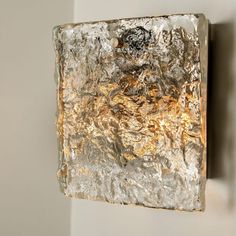 a piece of metal is hanging on the wall