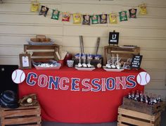 a baseball themed dessert table with confections on it