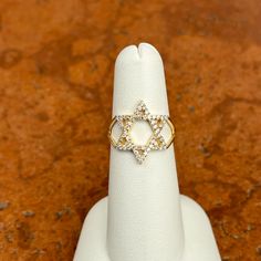 14KT yellow gold diamond, open design Star of David Judica ring. Round natural diamonds .35 Carat total weight natural diamonds Size 6 Can be resized for an additional fee Gold Star-shaped Diamond Ring, David Ring, Saint Jewelry, Diamond Star, Open Design, New Launch, Star Of David, Diamond Sizes, Pave Diamonds