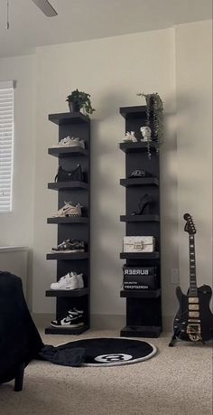 a living room filled with furniture and a guitar